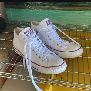 Lightly used white mid top converse